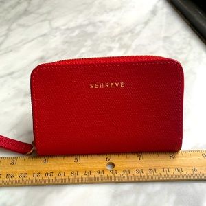 Beautiful bright red wallet with zipper closure